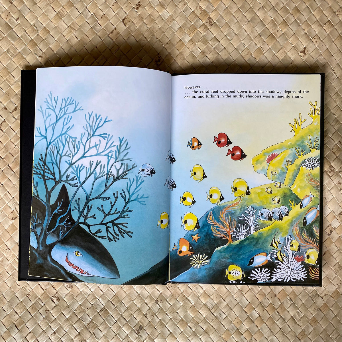 Interior illustration from The Shark Who Learned a Lesson showing a coral reef scene